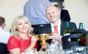 Cheltenham Couple holding Gold Cup